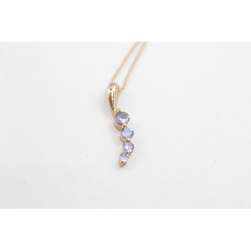 101 - 9ct gold tanzanite four stone pendant necklace (0.8g)