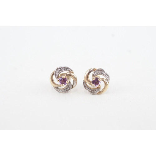 105 - 9ct gold amethyst openwork stud earrings (0.8g)