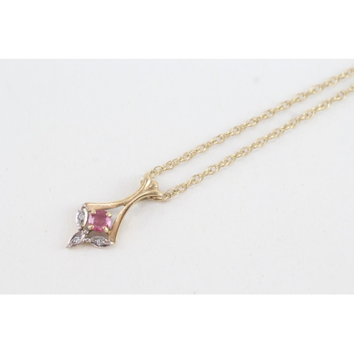 106 - 9ct gold diamond & ruby pendant necklace (2.3g)