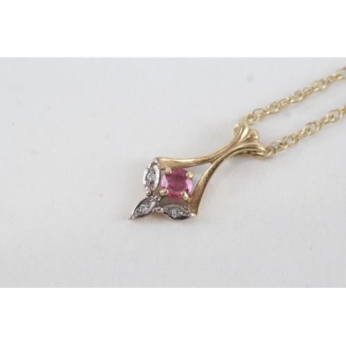 106 - 9ct gold diamond & ruby pendant necklace (2.3g)