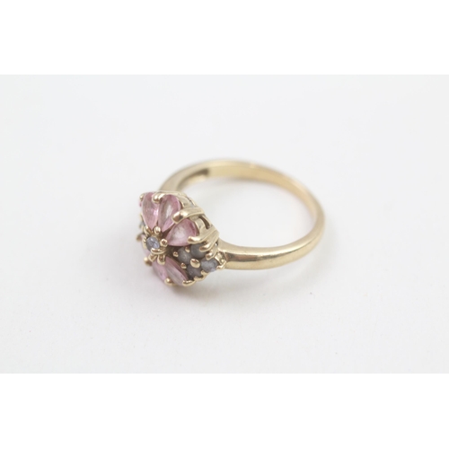 126 - 9ct gold pink sapphire and iolite set cluster ring (3.5g) Size N