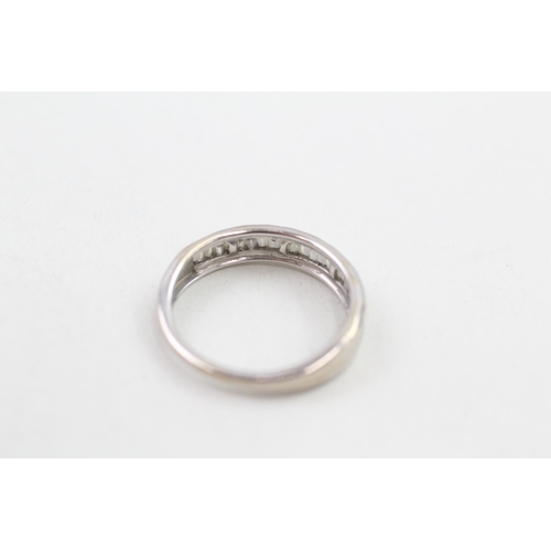 137 - 9ct white gold baguette cut diamond set half hoop eternity ring (2.3g) Size N 1/2