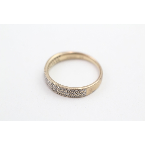 149 - 9ct gold diamond millegraine set half hoop eternity ring (2.2g) Size L