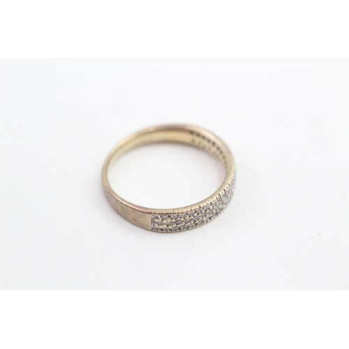 149 - 9ct gold diamond millegraine set half hoop eternity ring (2.2g) Size L