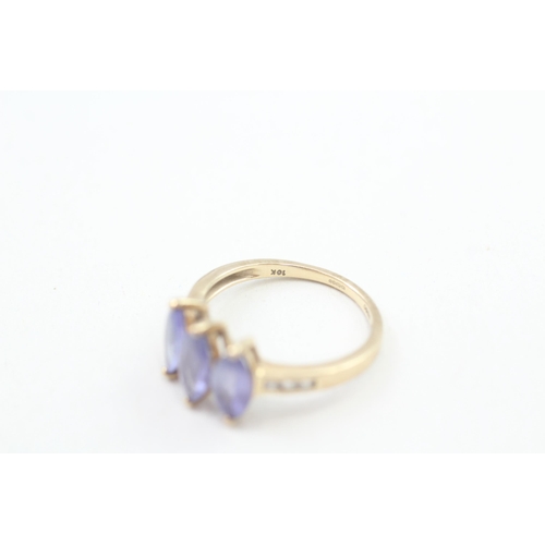 15 - 9ct gold tanzanite and white gemstone trilogy dress ring Size M  2.2g