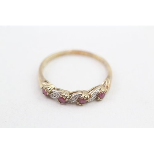 150 - 9ct gold diamond and ruby set band ring (2.1g) Size U 1/2