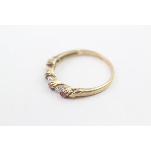 150 - 9ct gold diamond and ruby set band ring (2.1g) Size U 1/2
