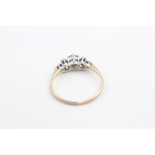 157 - 9ct gold diamond accented and emerald set dress ring (1.2g) Size M 1/2