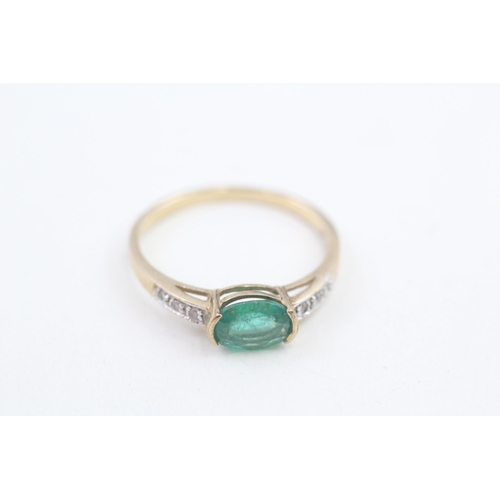 165 - 9ct gold emerald and white gemstone set dress ring (2.3g) Size U