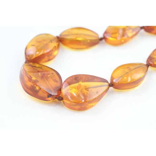 19 - 9ct gold clasp amber necklace individually knotted   47.1g