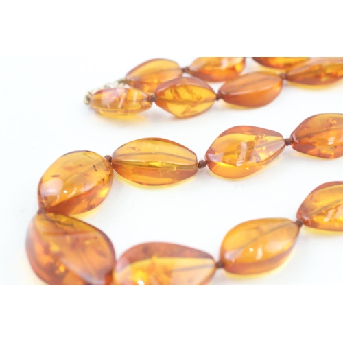 19 - 9ct gold clasp amber necklace individually knotted   47.1g