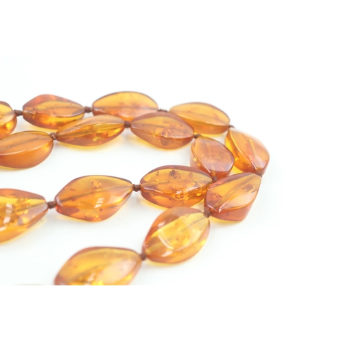 19 - 9ct gold clasp amber necklace individually knotted   47.1g