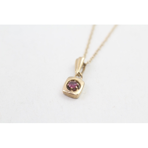 195 - 9ct gold ruby set pendant necklace (1.7g)