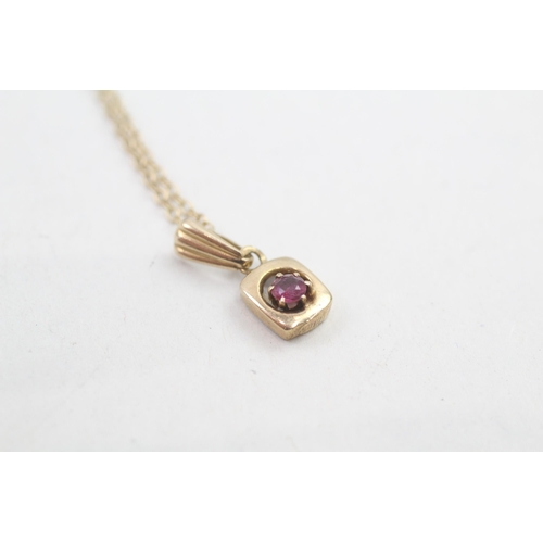 195 - 9ct gold ruby set pendant necklace (1.7g)