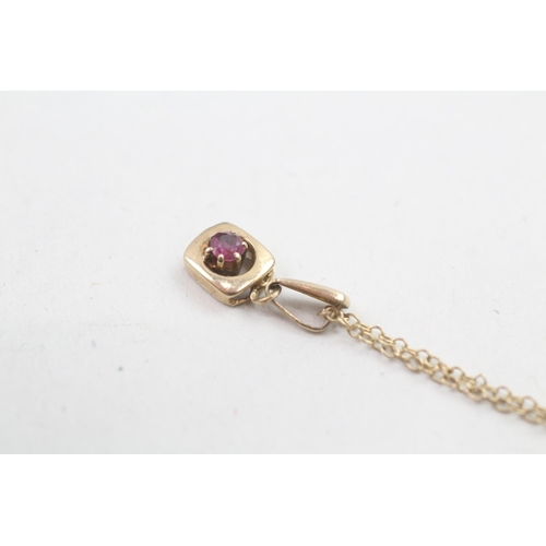 195 - 9ct gold ruby set pendant necklace (1.7g)