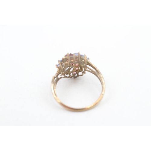 217 - 9ct gold pink tourmaline and blue sapphire set cluster ring (2.4g) Size P