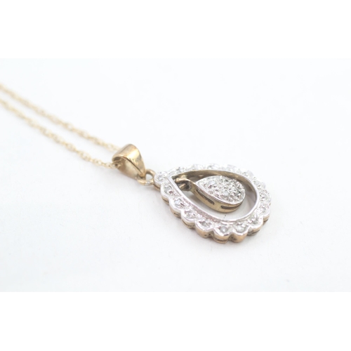 234 - 9ct gold diamond set pear shaped halo pendant necklace (2.1g)