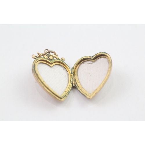 64 - 9ct gold back and front locket   4.4g