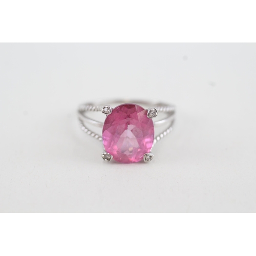 83 - 9ct white gold 'pink' topaz single stone ring with diamond highlight & split shank (3.1g) Size O