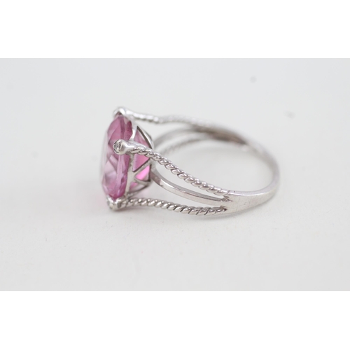83 - 9ct white gold 'pink' topaz single stone ring with diamond highlight & split shank (3.1g) Size O