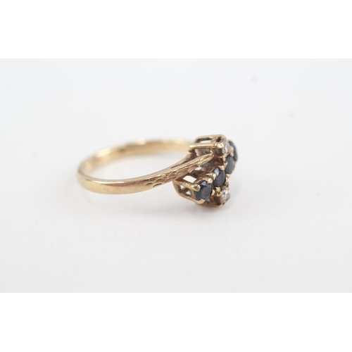 84 - 9ct gold diamond & sapphire dress ring (2.3g) Size L