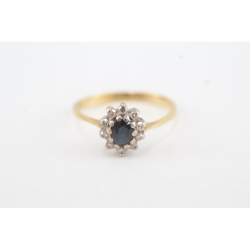 86 - 18ct gold diamond & sapphire oval cluster ring (3.1g) Size R