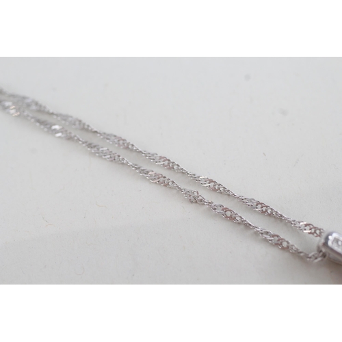 98 - 9ct white gold diamond & round garnet pendant necklace (3g)