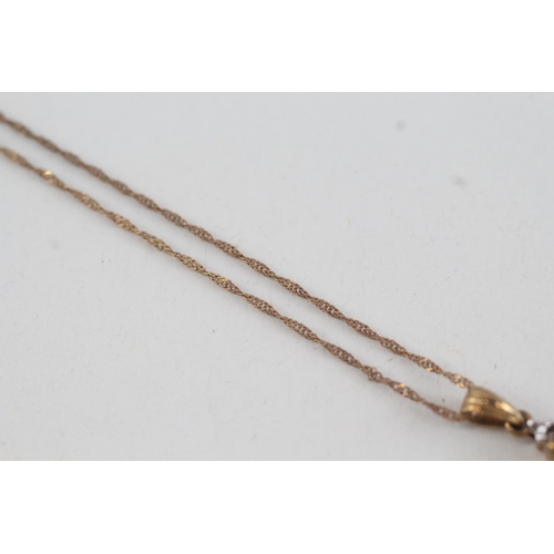 99 - 9ct gold diamond & tanzanite bar pendant necklace (1.4g)