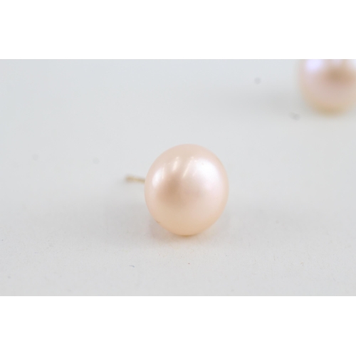 104 - 9ct gold cultured pearl single stone stud earrings (3.4g)