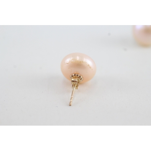 104 - 9ct gold cultured pearl single stone stud earrings (3.4g)
