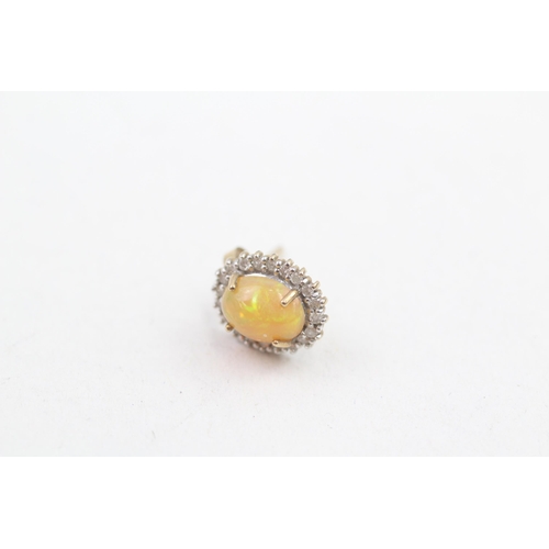 108 - 9ct gold diamond and enhanced opal set cluster stud earrings (1.8g)