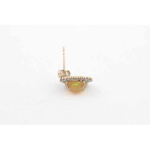 108 - 9ct gold diamond and enhanced opal set cluster stud earrings (1.8g)