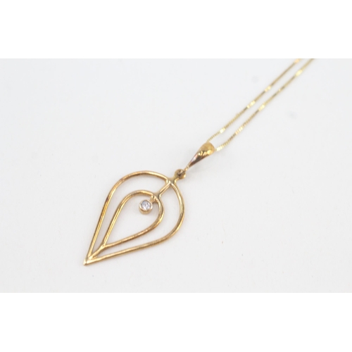 123 - 9ct gold diamond openwork pendant necklace (2.1g)