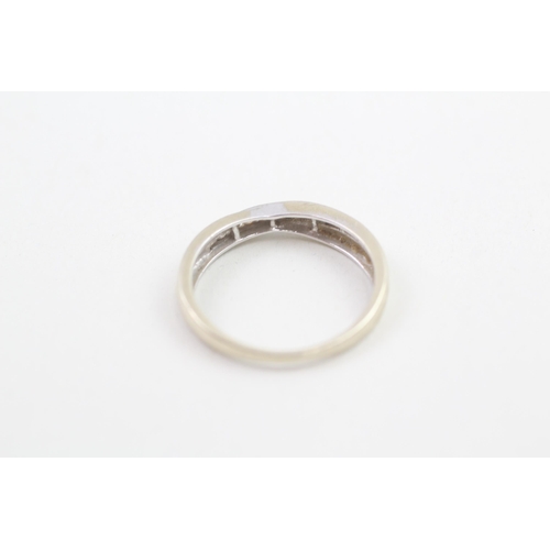 127 - 9ct white gold diamond set crossover eternity ring (2g) Size  O 1/2