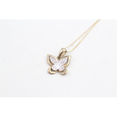 143 - 9ct white and yellow gold diamond set butterfly pendant necklace (1.3g)