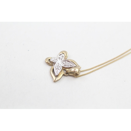 143 - 9ct white and yellow gold diamond set butterfly pendant necklace (1.3g)