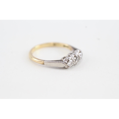 163 - 18ct gold & platinum diamond three stone ring (2.6g) Size  K