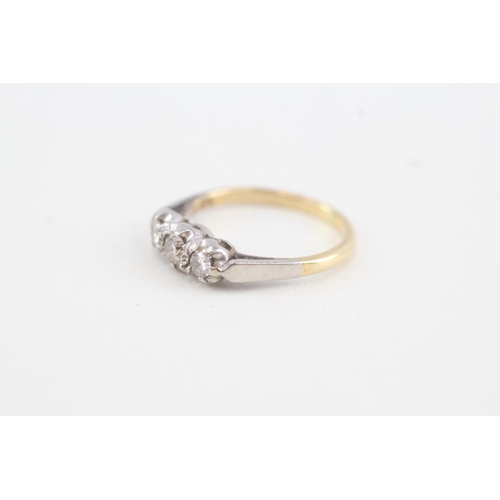 163 - 18ct gold & platinum diamond three stone ring (2.6g) Size  K