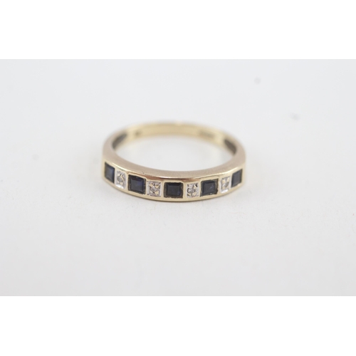 167 - 9ct gold diamond & sapphire half eternity ring (1.7g) Size  M