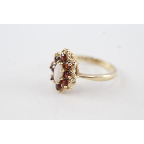 178 - 9ct gold opal & garnet oval cluster ring (3.6g) Size  O 1/2