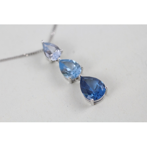 189 - 9ct gold vari-hue blue gemstone drop pendant necklace (3.2g)