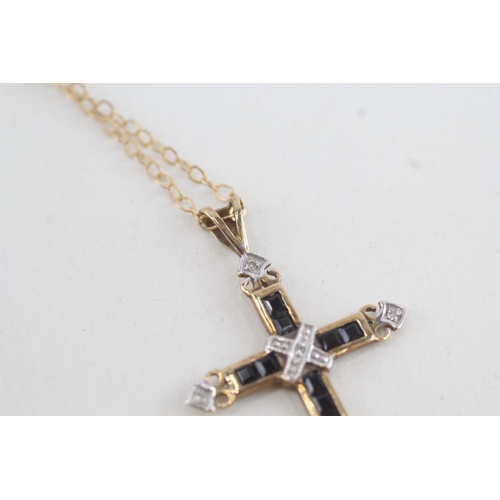 214 - 9ct gold diamond & sapphire cross pendant necklace (2.1g)