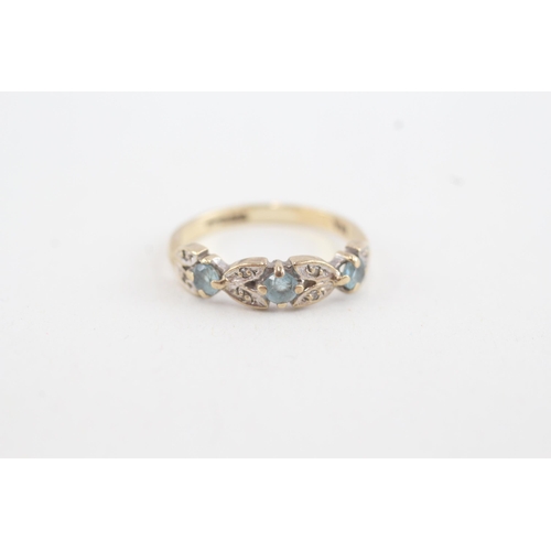 217 - 9ct gold diamond & topaz dress ring (1.4g)