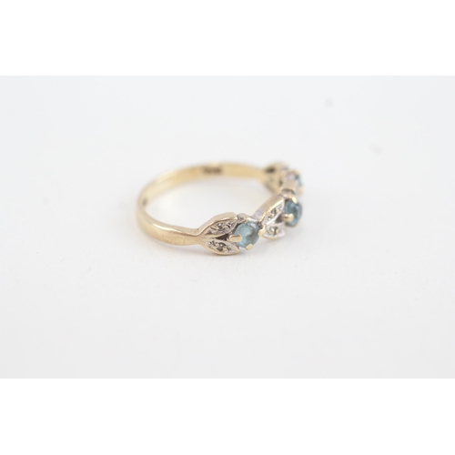 217 - 9ct gold diamond & topaz dress ring (1.4g)