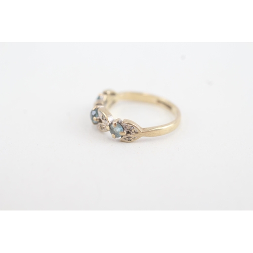 217 - 9ct gold diamond & topaz dress ring (1.4g)