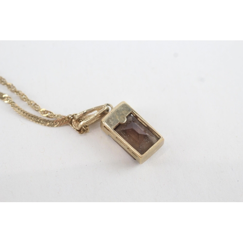 220 - 9ct gold diamond & smoky quartz pendant necklace (4g)