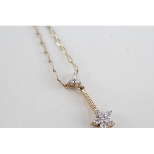 225 - 9ct gold diamond floral cluster pendant necklace (2.5g)