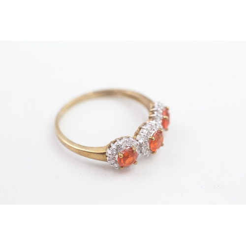 24 - 9ct gold diamond and fire opal trilogy cluster ring (2g) Size  P