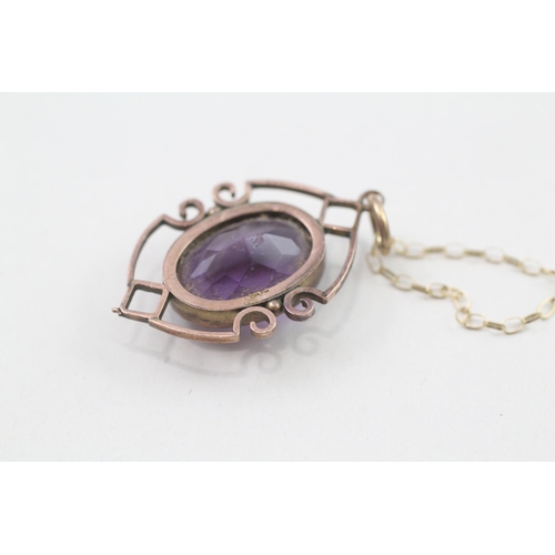 255 - 9ct gold amethyst framed pendant on chain (4g)