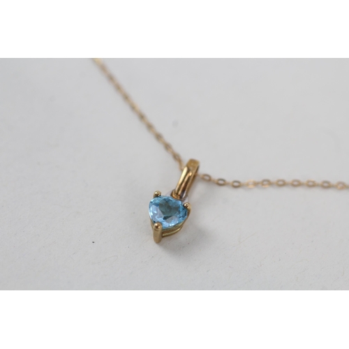 256 - 9ct gold heart cut blue topaz set solitaire pendant necklace (1g)